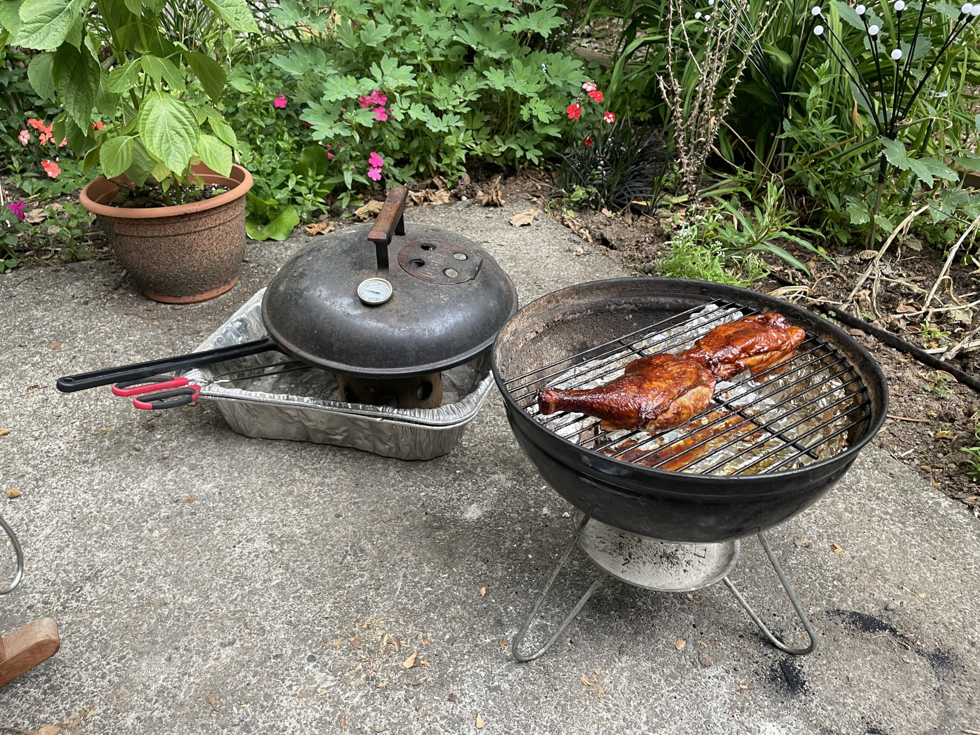 Two Smokey Joe cooking grates, one with 5 wires cut off